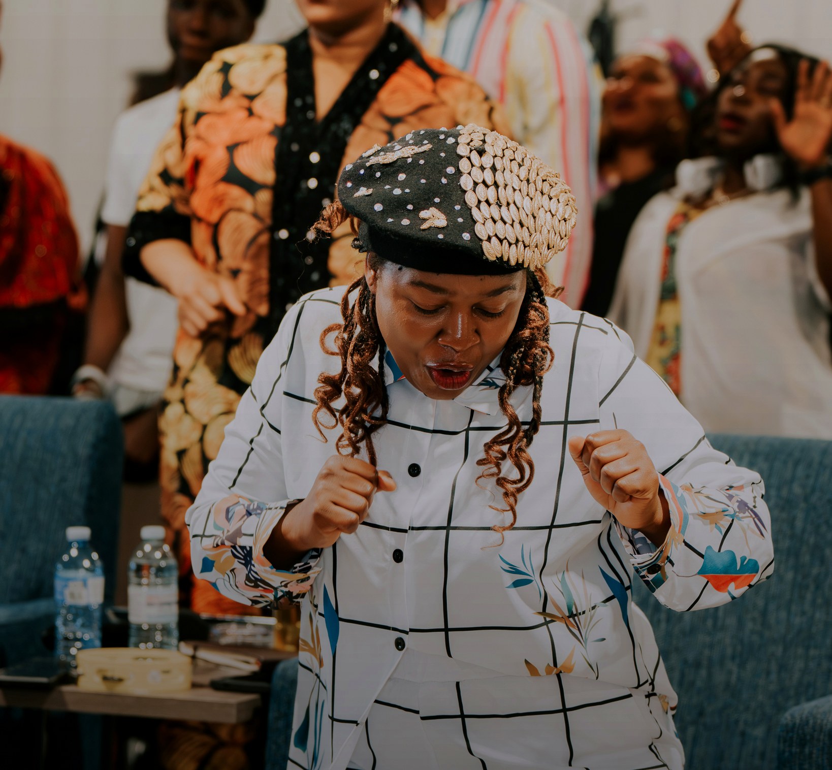 A joyful church member seated during fellowship