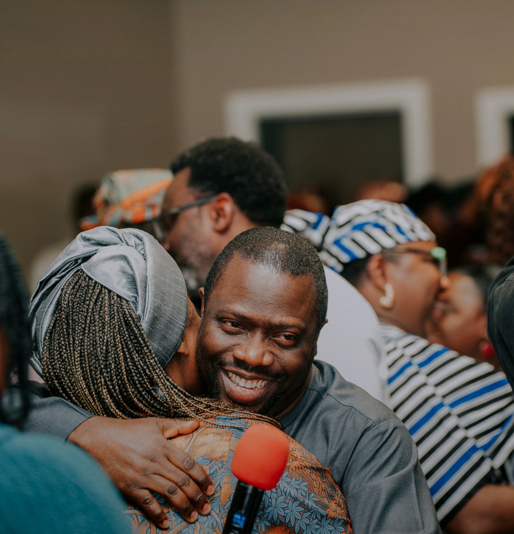 A warm embrace during church fellowship