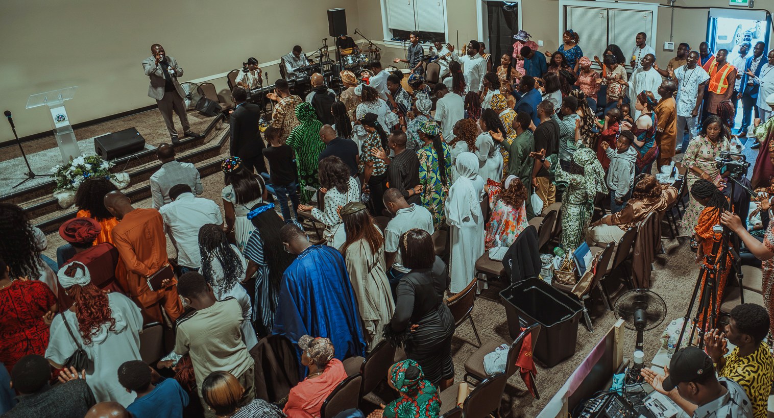 A full room of church members gathered together