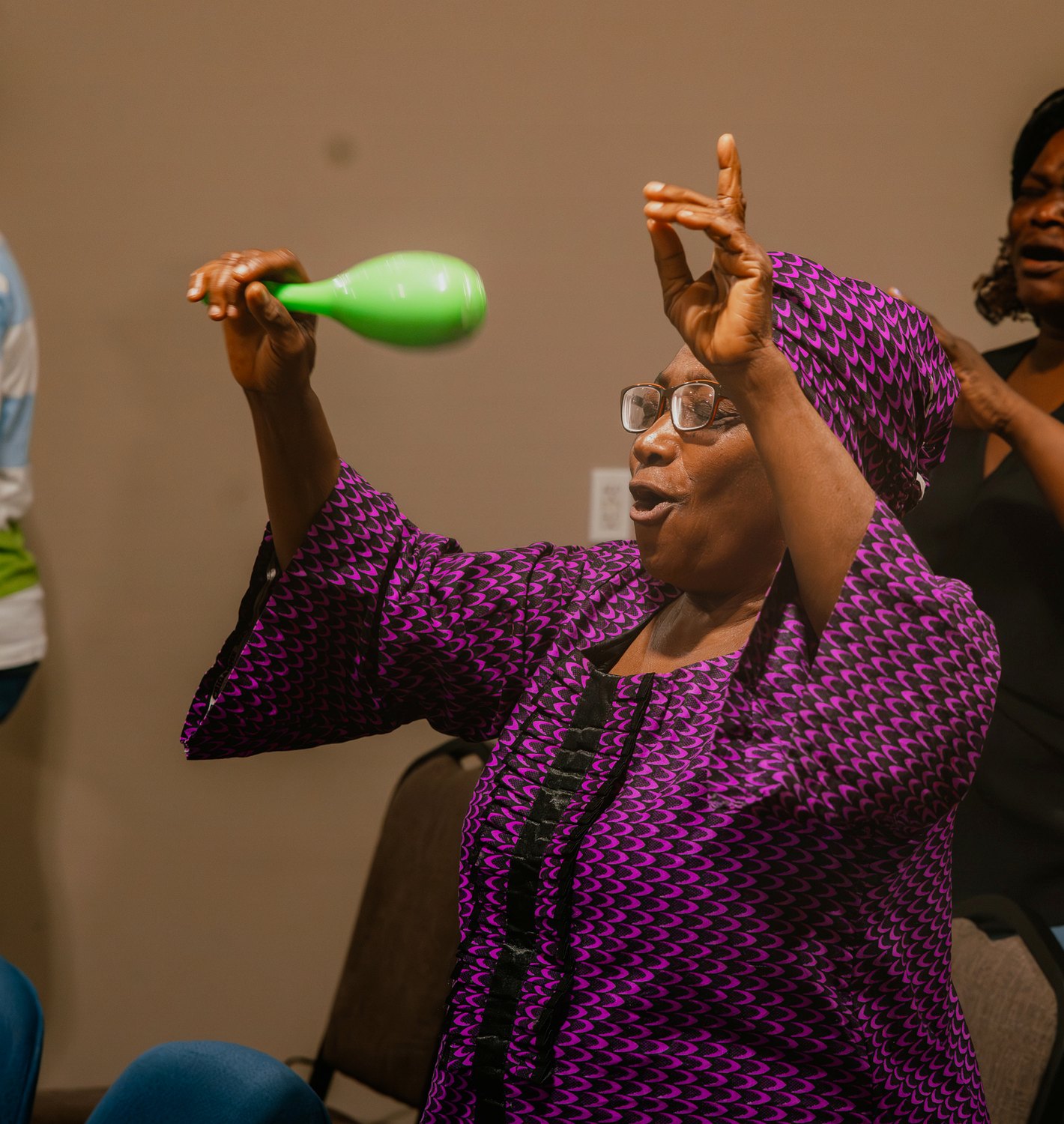 A joyful praise moment with an instrument