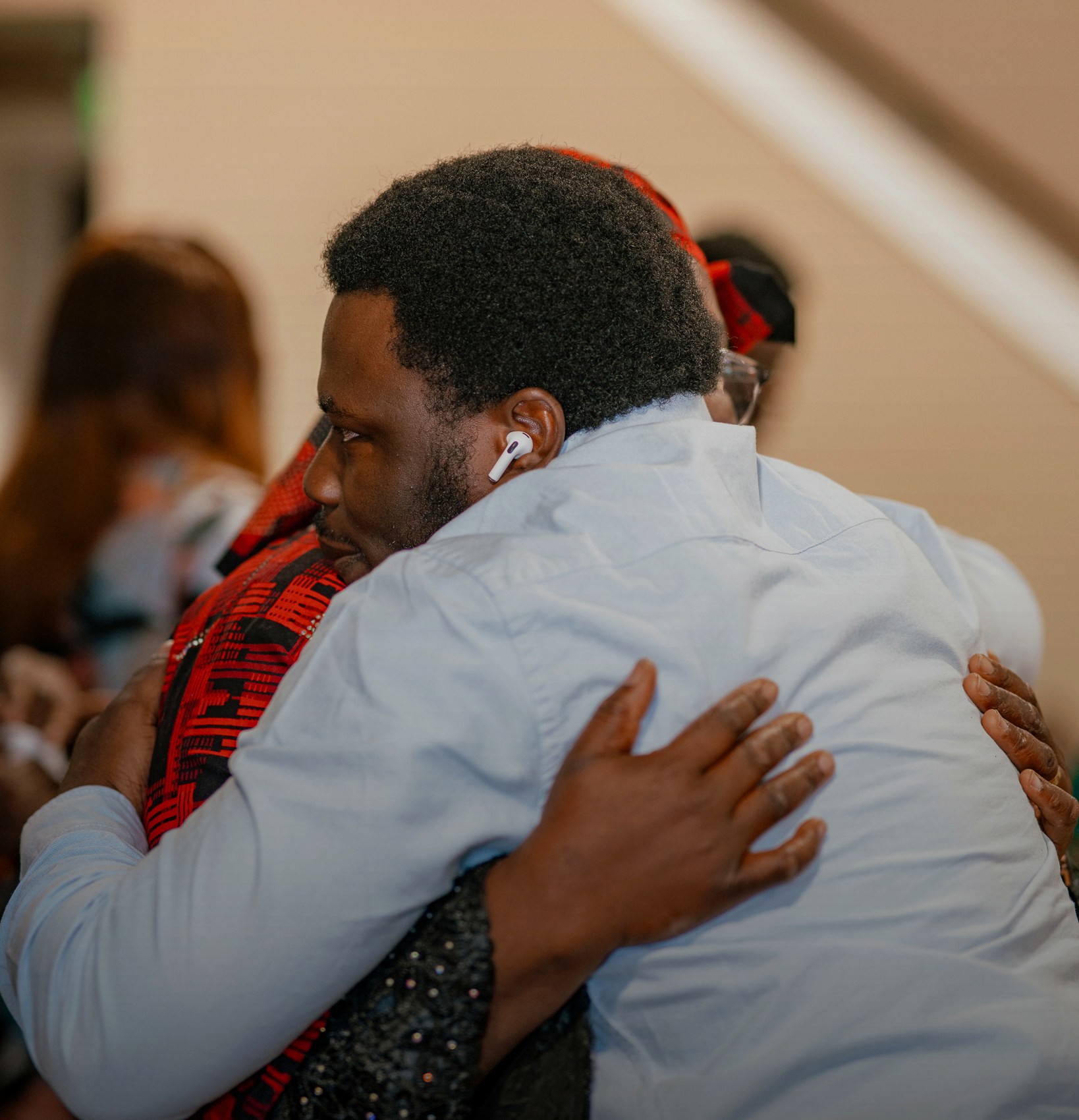 Church members greeting each other warmly