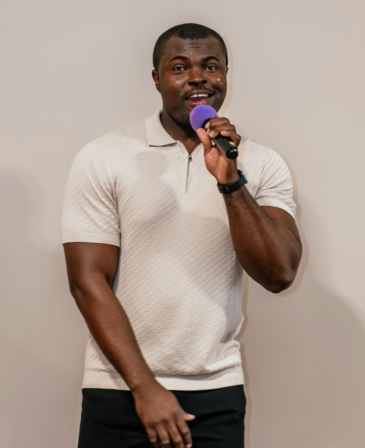 A church member speaking with a microphone