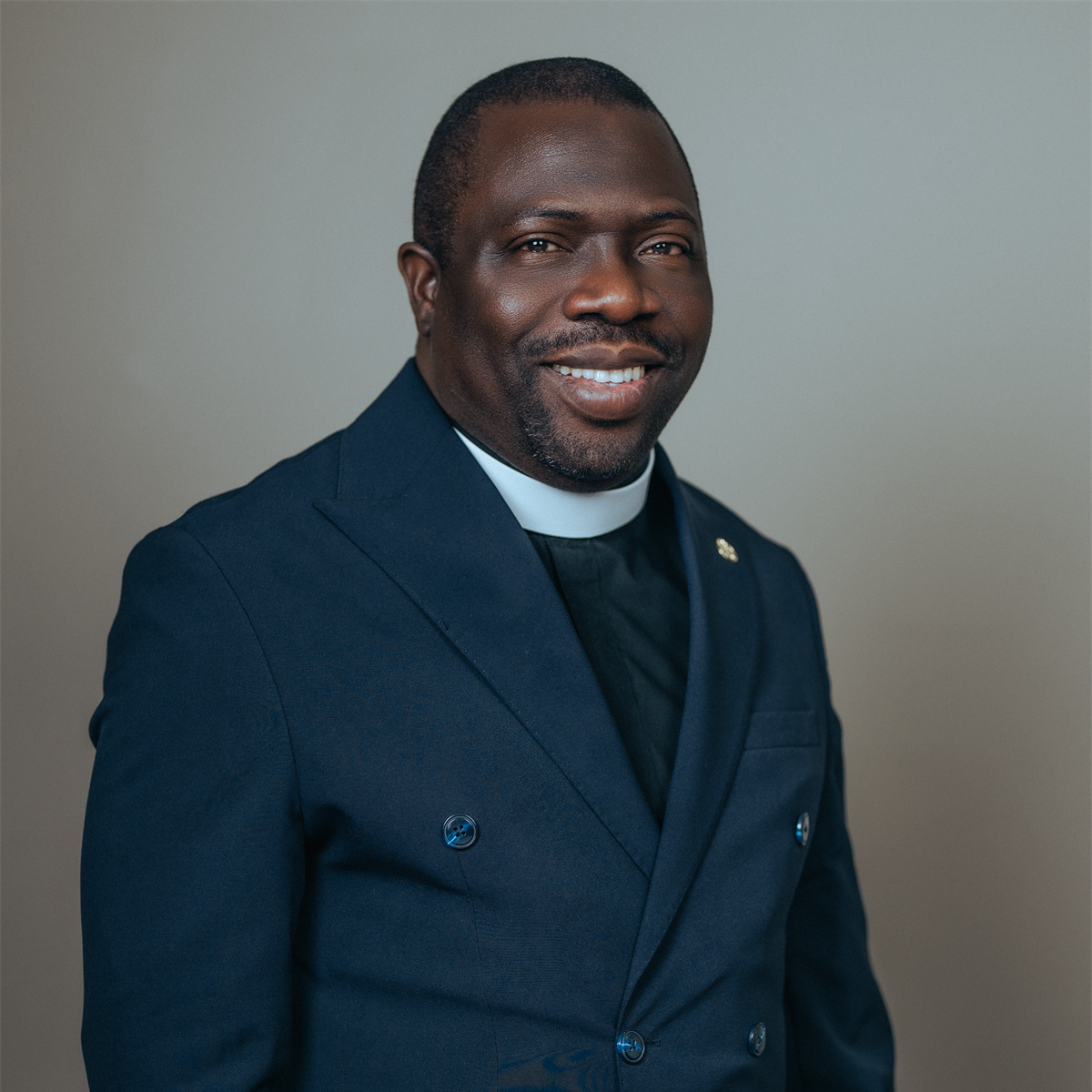 Pastor Ololade Taiwo Ogunbanwo wearing his clerical collar
